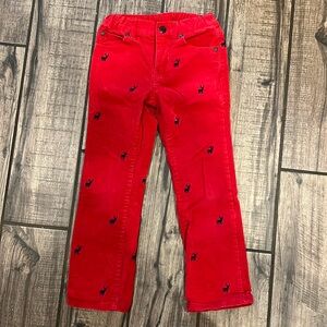 Janie and Jack red corduroy pants with navy blue reindeer.